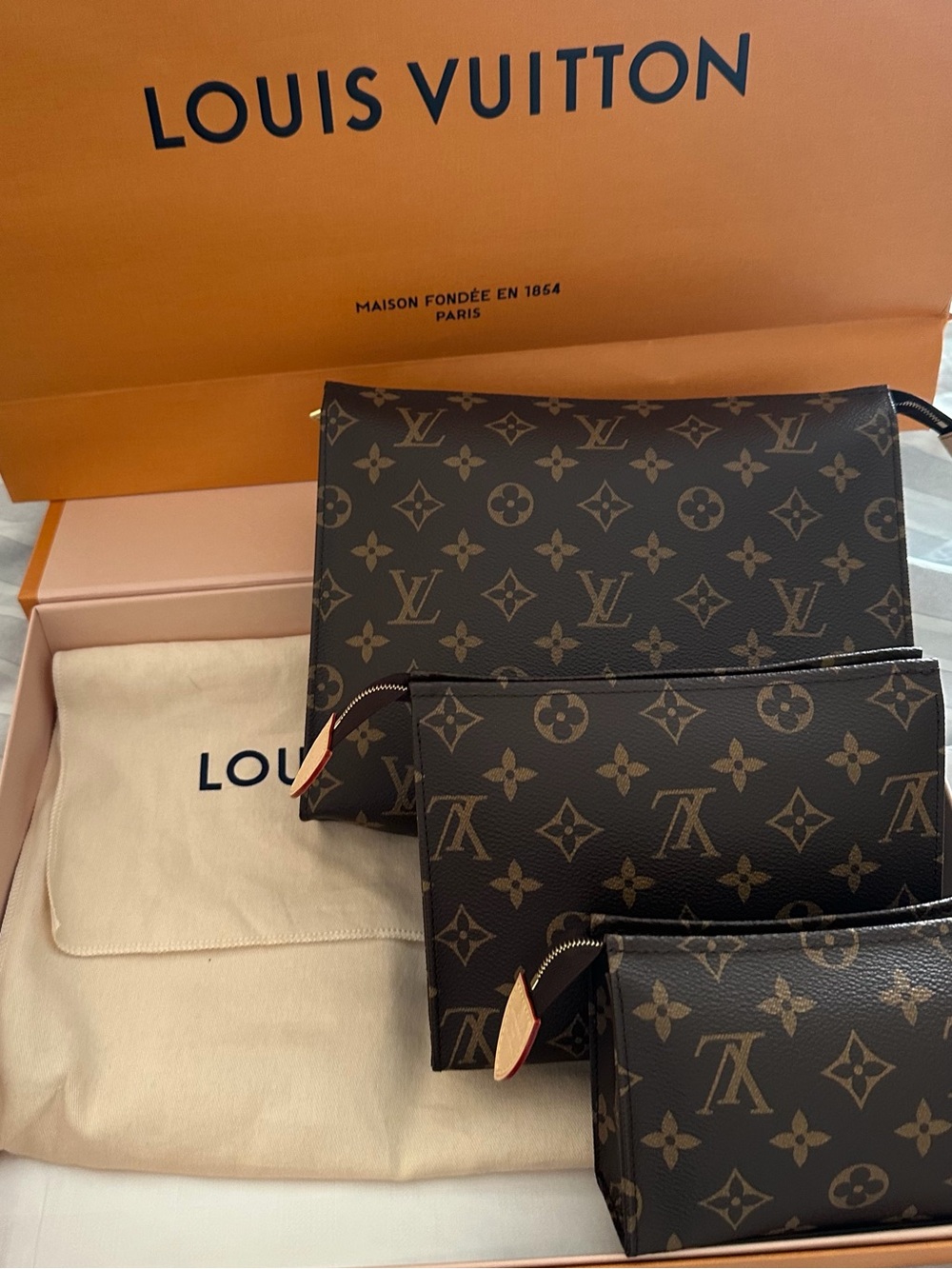 Louis Vuitton Monogram Pouch Trio - Brown